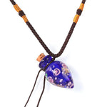 Collana per aromaterapia in vetro blu scuro con pendente diffusore per oli essenziali Aroma Bano