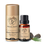 Confezione e bottiglia da 8 ml di olio essenziale di Abete Siberiano Aroma Bano con pigne e aghi di abete