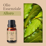 Bottiglia di olio essenziale di alloro Aroma Bano da 8 ml posizionata davanti a foglie fresche di alloro