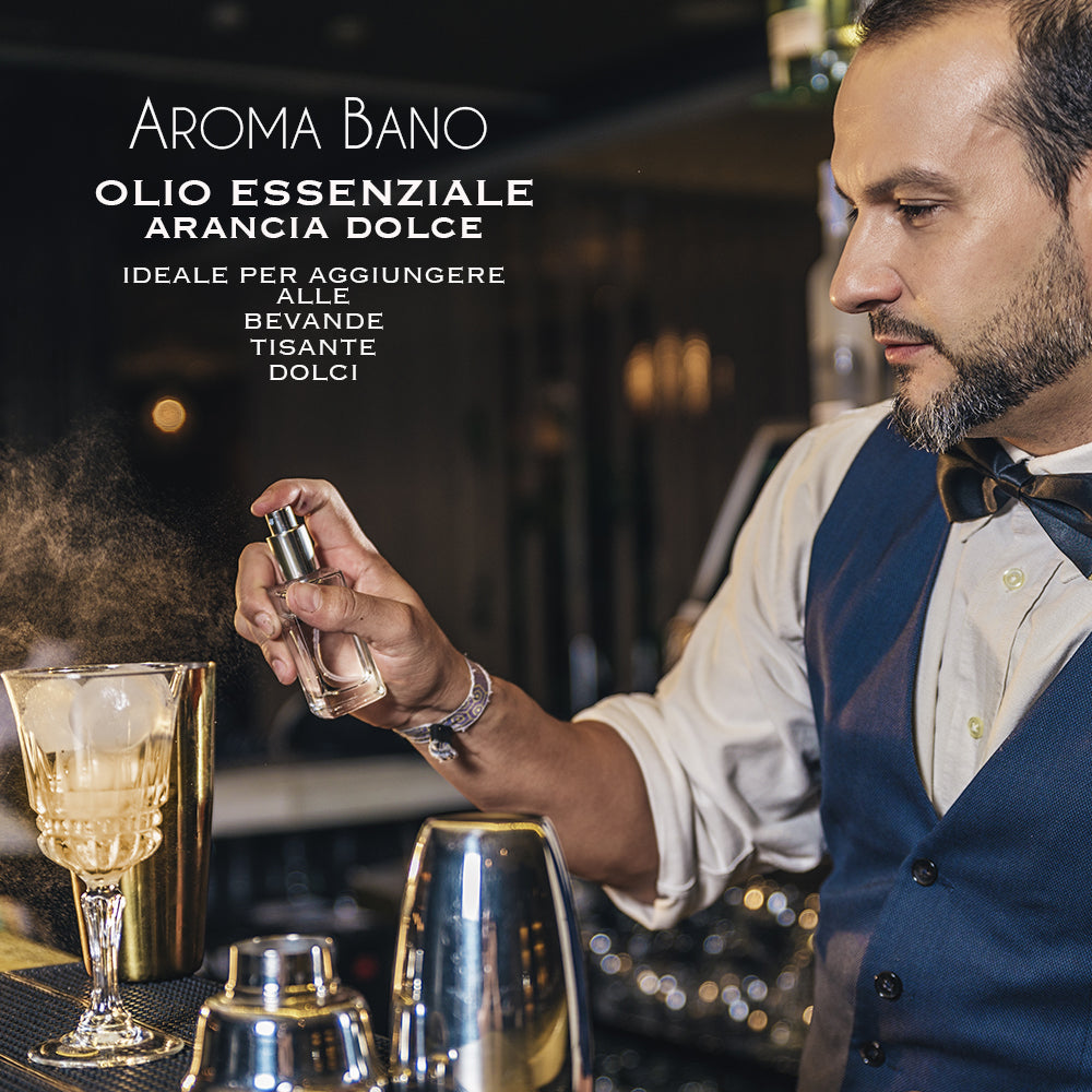 Olio essenziale di Arancia Dolce Aroma Bano utilizzato per aromatizzare cocktail al bar, con barman durante la preparazione di una bevanda