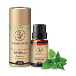 Confezione e bottiglia da 5 ml di olio essenziale di Melissa Aroma Bano con foglie di melissa