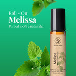 Olio essenziale di melissa Aroma Bano roll-on bottiglia da 10 ml con foglie fresche di melissa su sfondo verde
