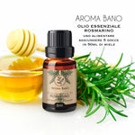 Olio essenziale di Rosmarino Aroma Bano per uso alimentare accanto a miele e rametti freschi di rosmarino