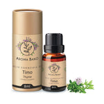 Confezione e bottiglia da 8 ml di olio essenziale di Timo Aroma Bano con pianta di timo