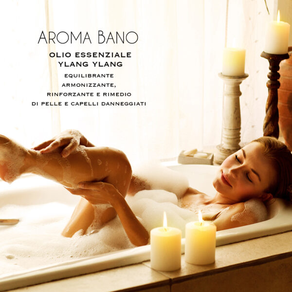 Olio essenziale di Ylang Ylang Aroma Bano utilizzato durante un bagno rilassante con candele accese